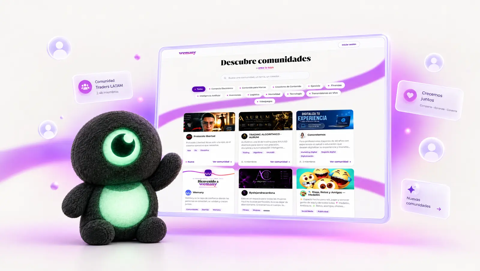 We saluda frente a un monitor con la página real de Descubre comunidades de WEMANY
